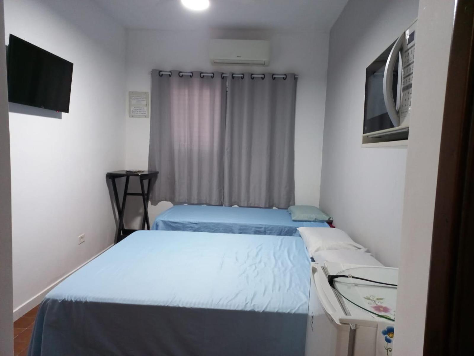 Suites 500M Praia Da Enseada グァルジャー エクステリア 写真